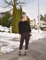 Resolution:  How to style striped trousers with a faux-fur pullover, ankle socks, and platform heels