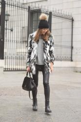 Black and grey faux fur coat