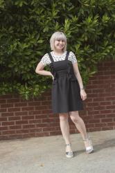 Outfit: Dinosaur Print T-shirt, Black Ruffled Pinafore, and Silver Platforms