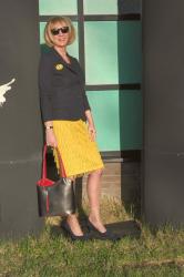 Swinging yellow skirt with a blue jacket