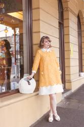 Yellow Lace Coat and Supporting Other Women