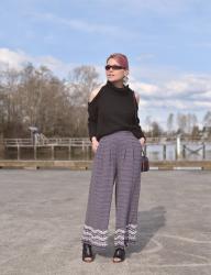 Polished:  Styling a cold-shoulder sweater with patterned palazzo pants and cut-out booties