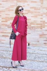 Woman in red: ruffled blouse and wide leg cropped pants