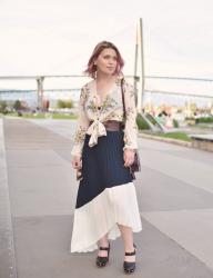 Pleats and thank-you:  styling an asymmetrical pleated maxi skirt with a floral blouse, corset belt, and mary-jane heels