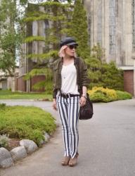 At the Abbey:  Styling a tee and striped jeans with a bomber jacket and baker boy cap