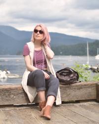 On the dock:  striped crop top, slouchy trousers, sleeveless coat, and open-toe booties