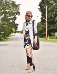 Heat styled:  patterned shift dress, long denim jacket, and patchwork over-the-knee boots