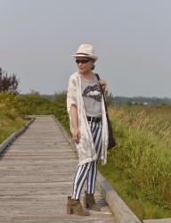 Smoke screen:  striped skinny jeans, sequinned tee, straw fedora and a damask-patterned kimono 