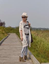 Smoke screen: striped skinny jeans, sequinned tee, straw fedora and a damask-patterned kimono