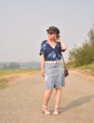 PJ party: styling a pyjama top with a distressed denim skirt, ankle-strap sandals, and a newsboy cap