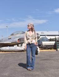Flight plan: styling a tie-front floral blouse with flare jeans and a bandana head scarf