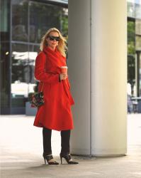 An orange statement coat for Meetings or Meet Me For Drinks