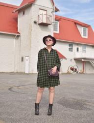 Curated:  Plaid shirtdress, fishnet tights, platform booties, and a felt fedora