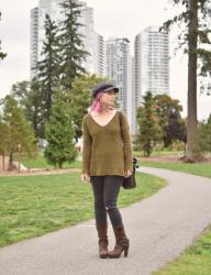 Simple/Statement: Tunic sweater, skinny jeans, platform harness boots, and a baker boy hat