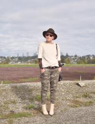 Plush crush:  faux-fur top layered over a sheer floral tee, with camo pants and ivory ankle boots