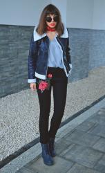 navy shearling jacket and embroidered jeans