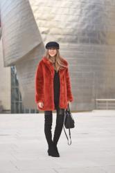 Red faux fur coat