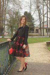 Red flowers on black dress