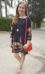 Navy Printed Dresses and Red Saddle Bag