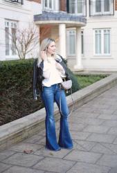 FLARED JEANS AND WHITE SWEATER 