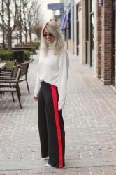 White Distressed Sweater + Track Pants.