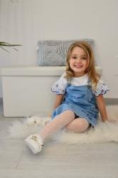 La salopette: un must have della moda bambini