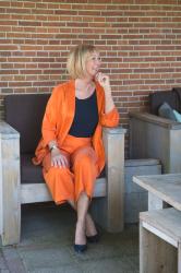 Orange trouser suit