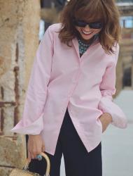 A Pink Oxford Shirt Styled For Work And Date Night 