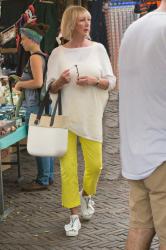 Lemon yellow trousers on the Noordermarkt