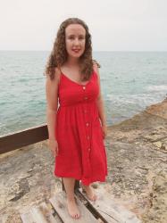 Red dress at the beach