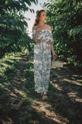 Garden with sweet cherries and maxi boho dress