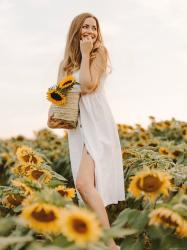 Retro button dress and field of sunflowers