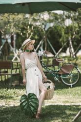 Vacay outfit: white sundress and tassel earrings