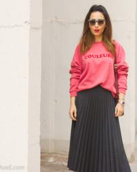 Tendencias Streetstyle La nueva forma de llevar la sudadera, con falda midi