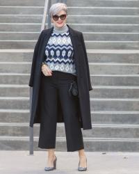 overcoats, sweaters, and wide-leg pants