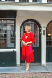 A red and pink pleated skirt