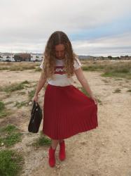 Red pleated skirt