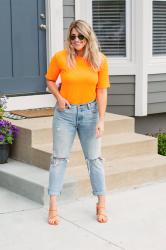 Neon Orange T-shirt + Levi’s.