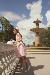 Pink Dress by the Fountain 
