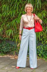 Baby blue checked trousers with a golden top