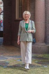 A houndstooth blazer in green and cream