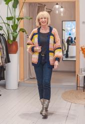 Multi-coloured knitted cardigan and fun in a store