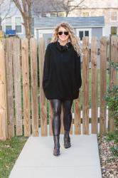 Black Amazon Tunic Sweater + Studded Booties.