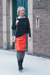 An orange leather skirt at the docks