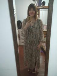 Outfit propio: Vestido de animal print.