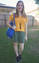 Olive and Mustard Outfits With Blue Bags