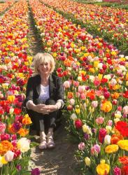 Black trouser suit in the Dutch tulip fields