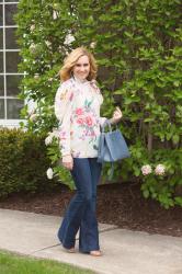 Daydreaming in a Dramatic Floral Blouse and Flared Jeans