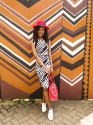 How To Wear A Zebra Print Dress With White Sneakers