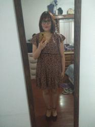 Outfit propio: Vestido de animal print.